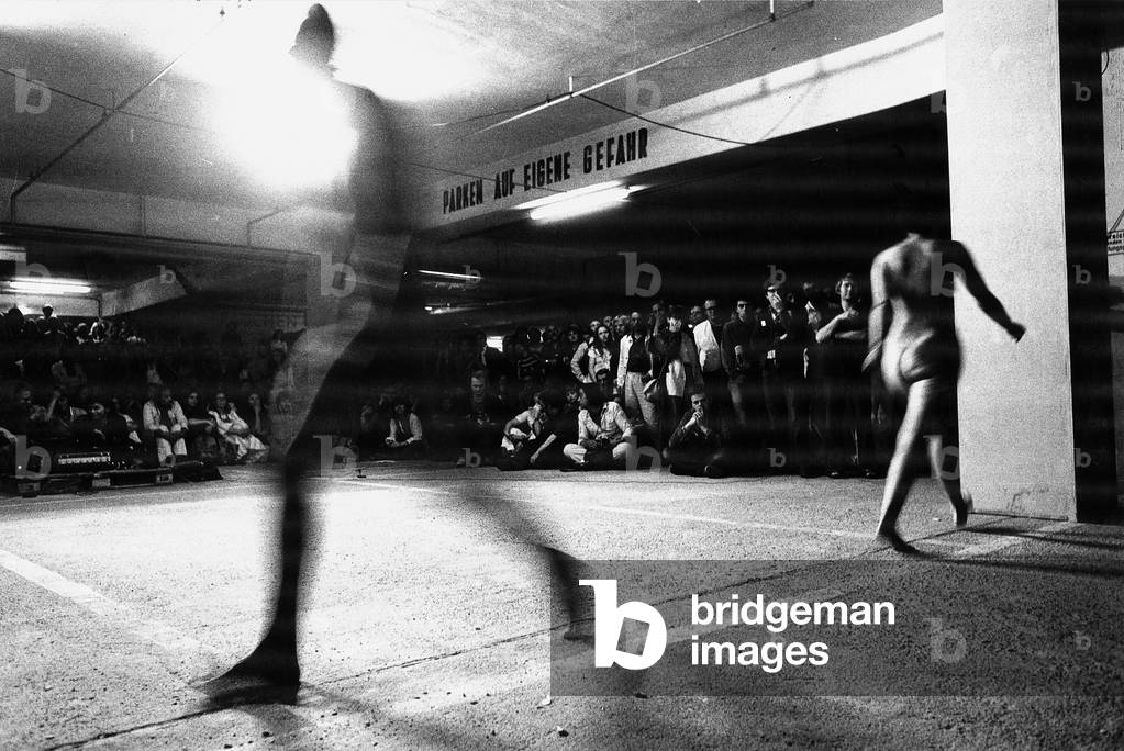 Marina Abramovic with Ulay during a performance at Documenta, Kassel, Germany, 1977 (b/w photo)