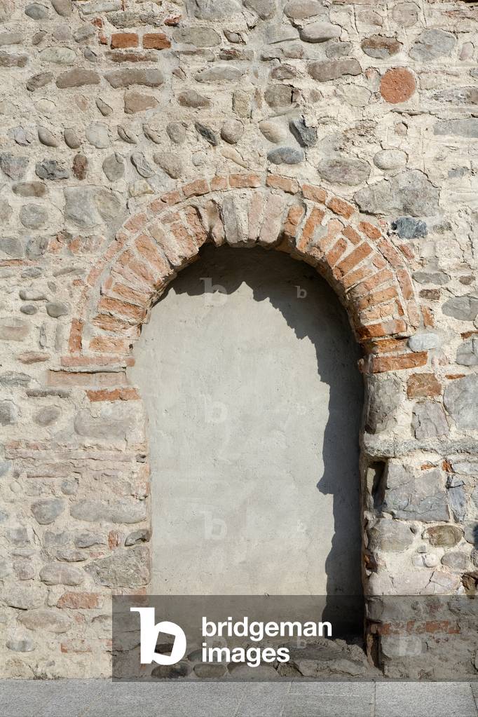 View of a Romanesque door, facade of Church of Santo Stefano, Vimercate, Monza Brianza, Lombardy, Italy (photo)