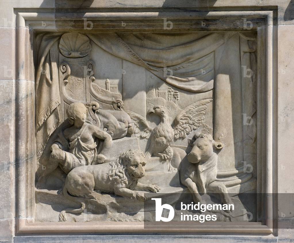 High relief depicting the animals symbolizing the evangelists surrounding a trone (tetramorph) (1654). Cathedral (dome or duomo) of Milan Italy