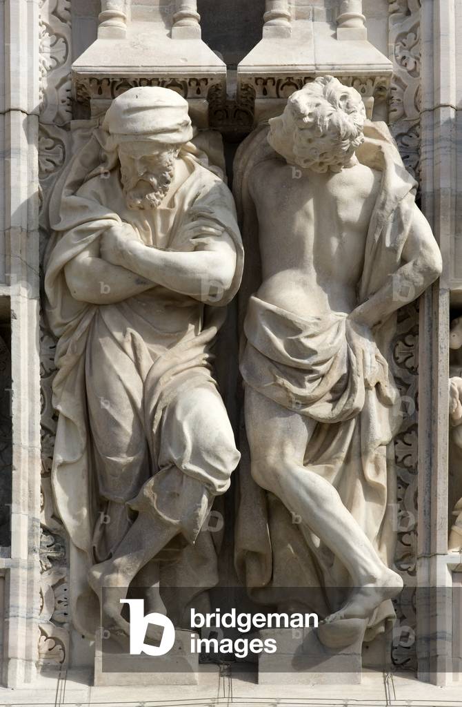 High relief representing two Atlanteans (telamon), c.1650, detail of the facade of the Duomo of Milan, Lombary, Italy (photo)