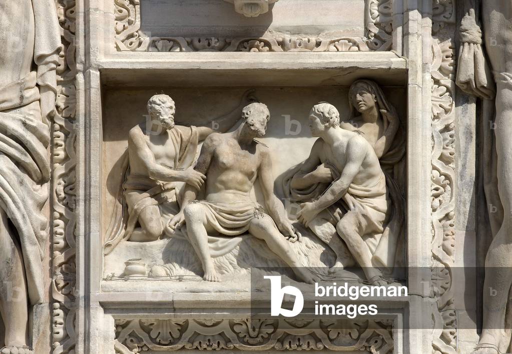 High relief depicting Job on his manure pile overwhelmed by all misfortunes by Carlo Maria Giudici. 1795. Cathedral (dome or duomo) of Milan Italy