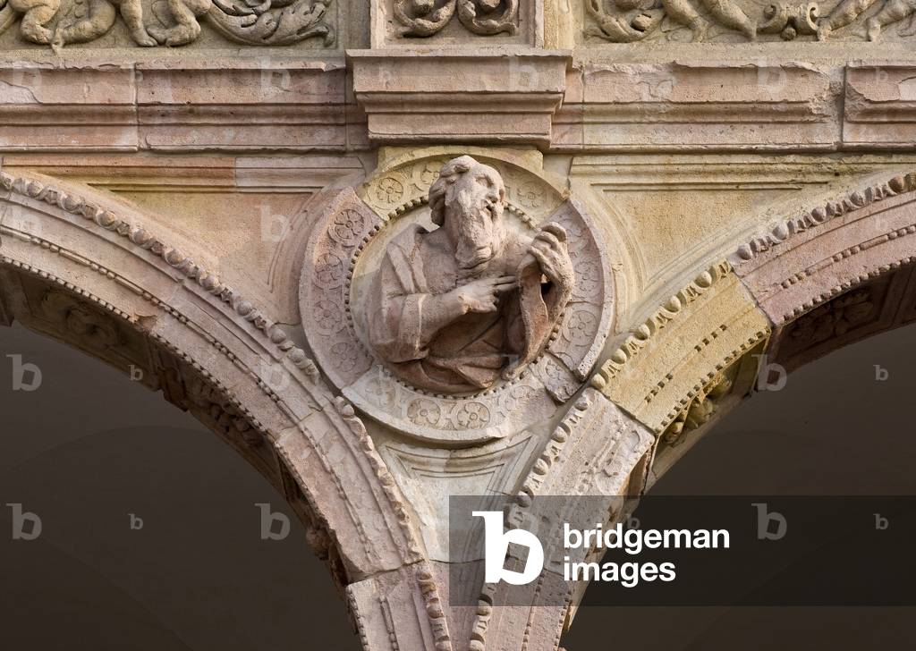 Male figure by Giovanni Antonio Amadeo, Cloister of Ospedale Maggiore, Universita degli Studi, Milan, Lombardy, Italy (photo)