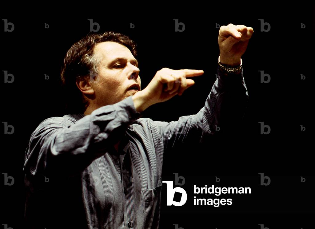 Mariss Janson conducting in Paris, 1998. Latvian conductor b. 14 January 1943-.