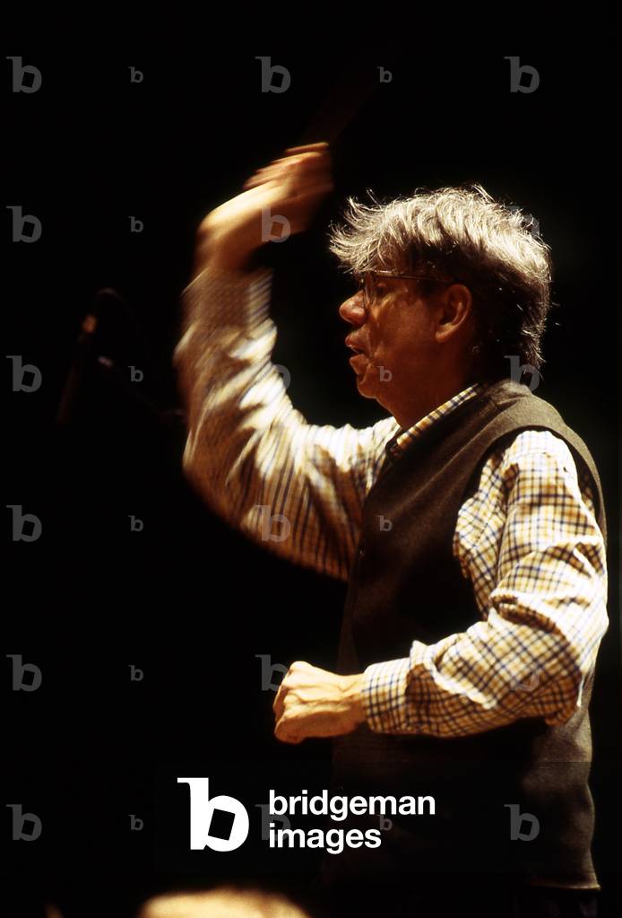 Theodor Guschlbauer conducting in Paris, France, in 1998. In profile. TG: Austrian conductor, b 1939 -.