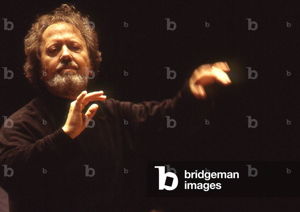 John Nelson - portrait of the American conductor conducting in February 2002. b. 6 December 1941 .