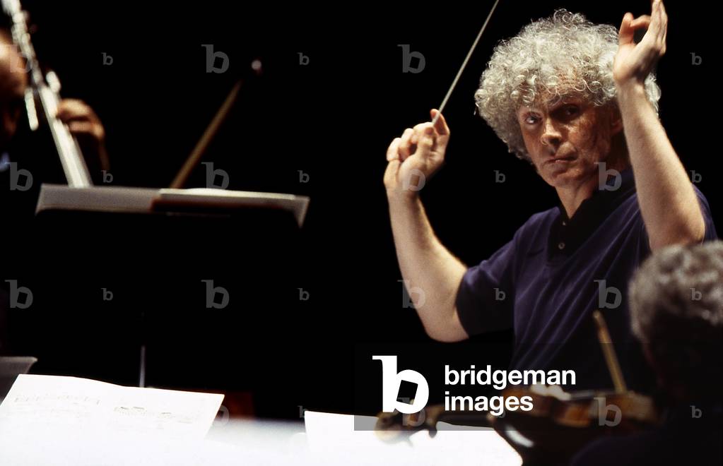 Simon Rattle - British conductor born in 1955 rehearsing in Paris in 1999