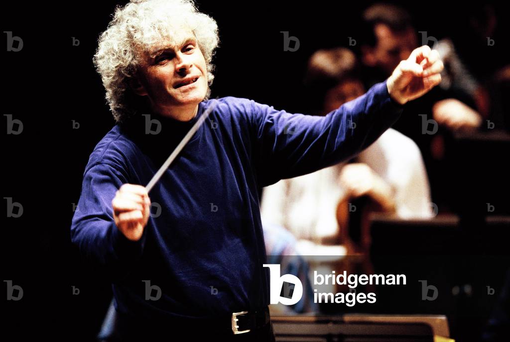 Simon Rattle - English conductor conducting the Birmingham Orchestra, 1999. Cite de la  Musique, Paris, France.