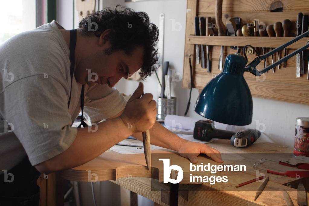 Violin maker at work.
