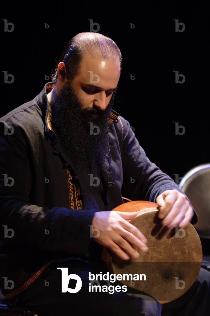 Ali Rahimi - playing the Tombak at the Theatre de la ville, Paris, November 2007. Persian musician.