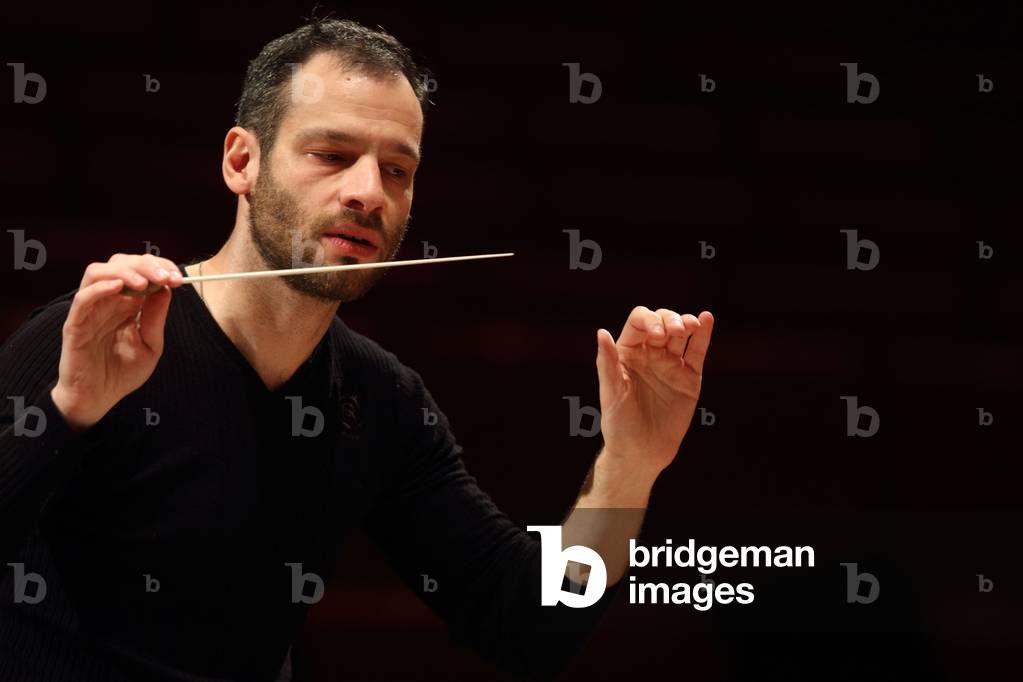 Dimitri Slobodenyuk conducting the Orchestre de Paris at the Salle Pleyel, Paris, January 2010. Russian conductor.