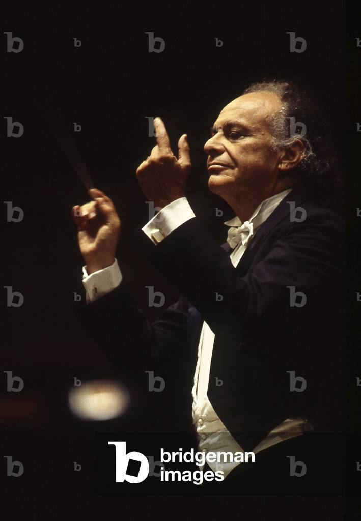 Lorin Maazel. Portrait photograph taken of the musician conducting in Paris, 1995. American conductor, born in 1931.