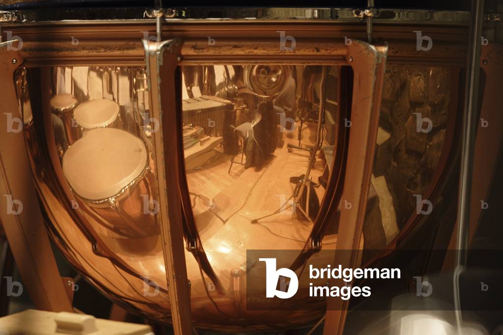 Reflection of timpani drums in the copper of a  timpani. Percussion sections of a symphone orchestra.