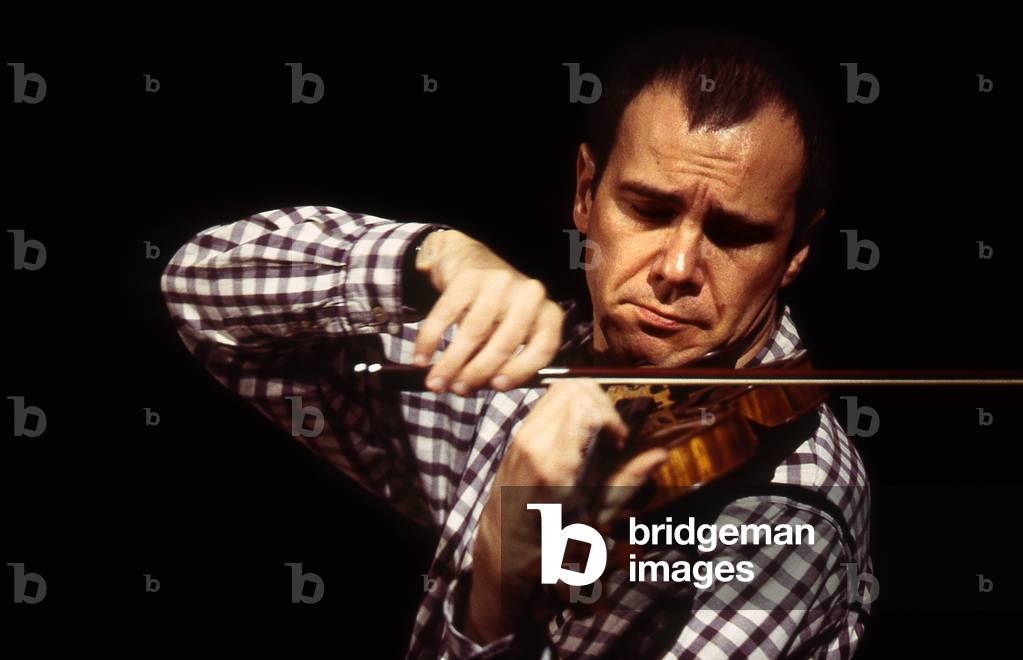 Raphael Oleg portrait of the french violonist playing violin born in 1959. Paris 2003