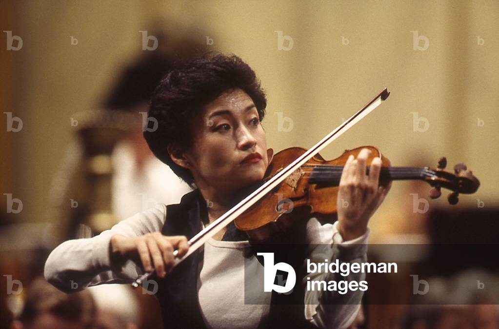 Kun Wha Chung - portrait of the Korean violinist  performing at the Champs Elysees Theatre, Paris, France, March 1995. b. 1948.