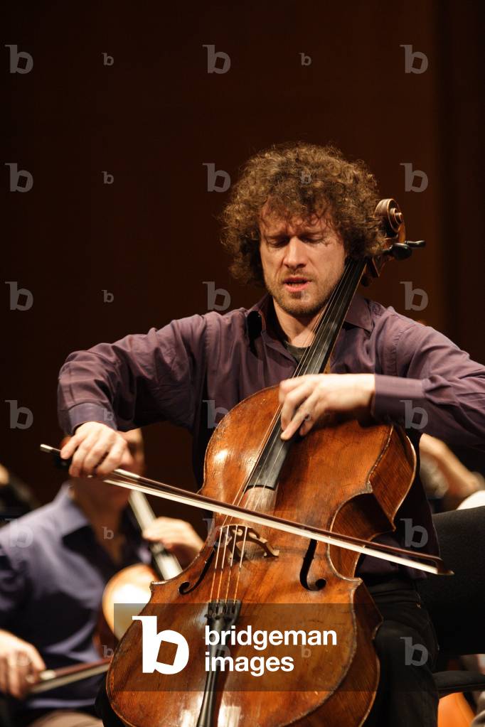 Francois Salque rehearsing with L ' Ensemble Orchestral de Paris, in Paris, France. January 2009. FS: Fench cellist
