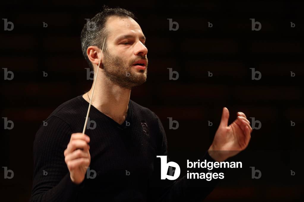 Dimitri Slobodenyuk conducting the Orchestre de Paris at the Salle Pleyel, Paris, January 2010. Russian conductor.