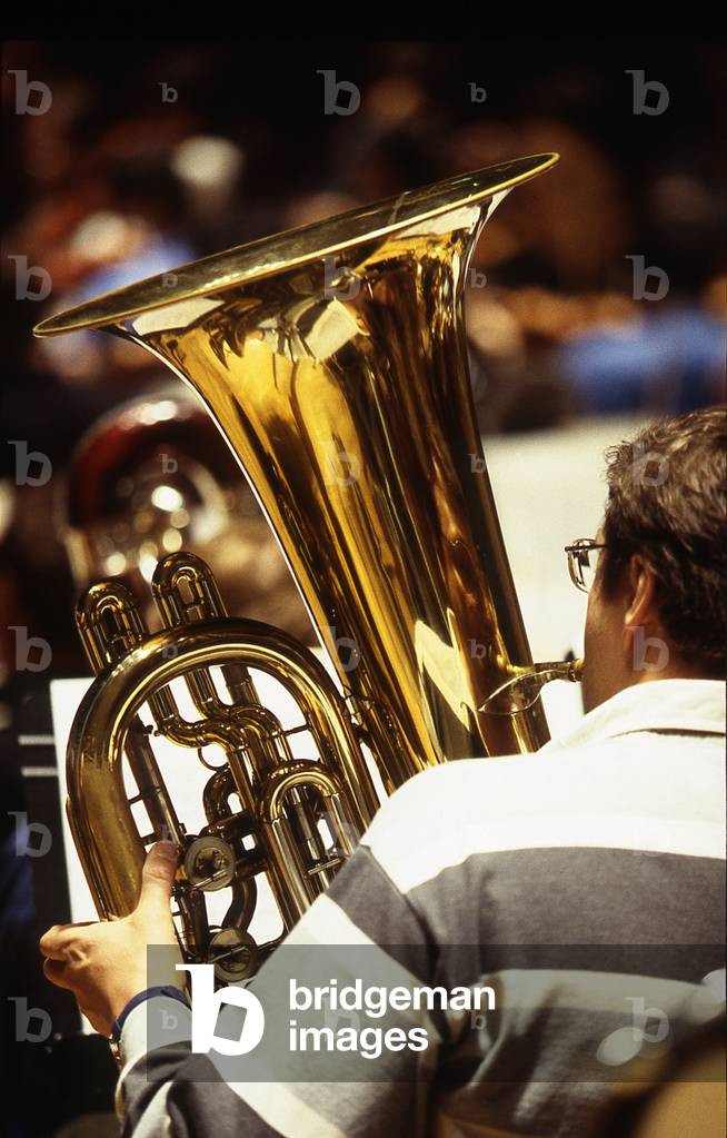 Tuba - the brass instrument being played, viewed from behind