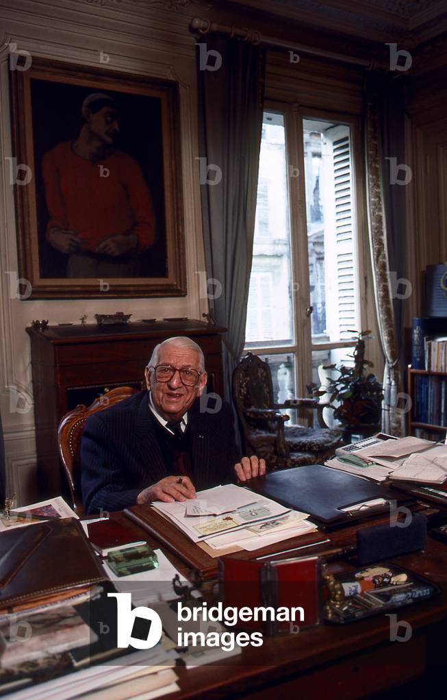 Henri Sauguet -portrait of the  French composer at his desk in Paris, France, 1987. 18 May 1901 - 22 June 1989.