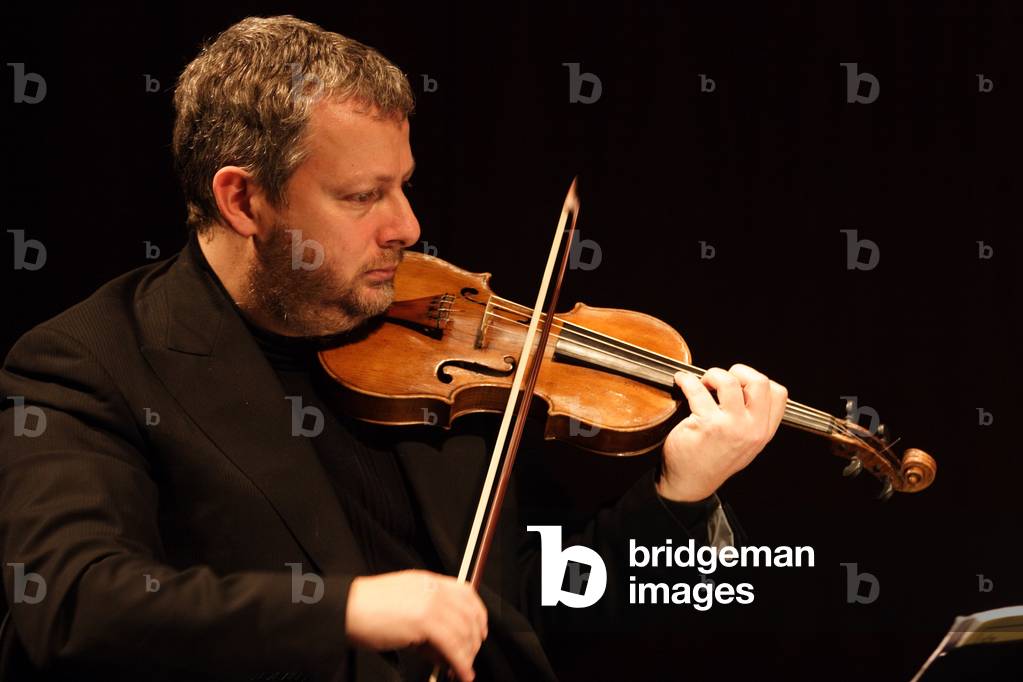 Fabio Biondi - playing the violin at the Theatre de Laville, Paris, January 2008. Italian Baroque violinist:  Born in 1961.