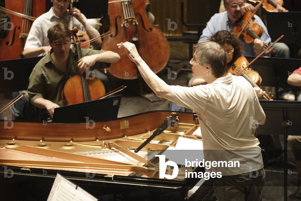 Christian Zacharias - German conductor and pianist at rehearsal with the 'Ensemble Orchestral de Paris' at the Theatre des Champs Elysees, Paris, France, June 2007. - B.1950