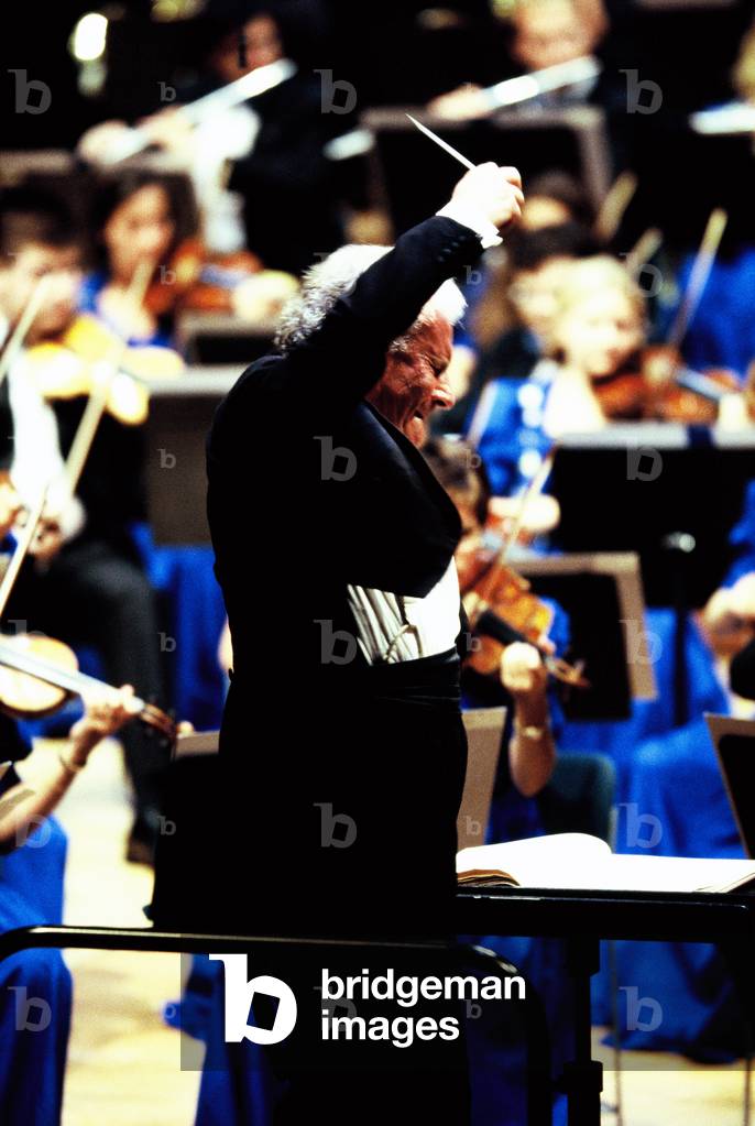 Colin Davis in July 1999 conducting the European Union Youth Orchestra, Cité de la Musique, Paris, France. English conductor, b. 1927