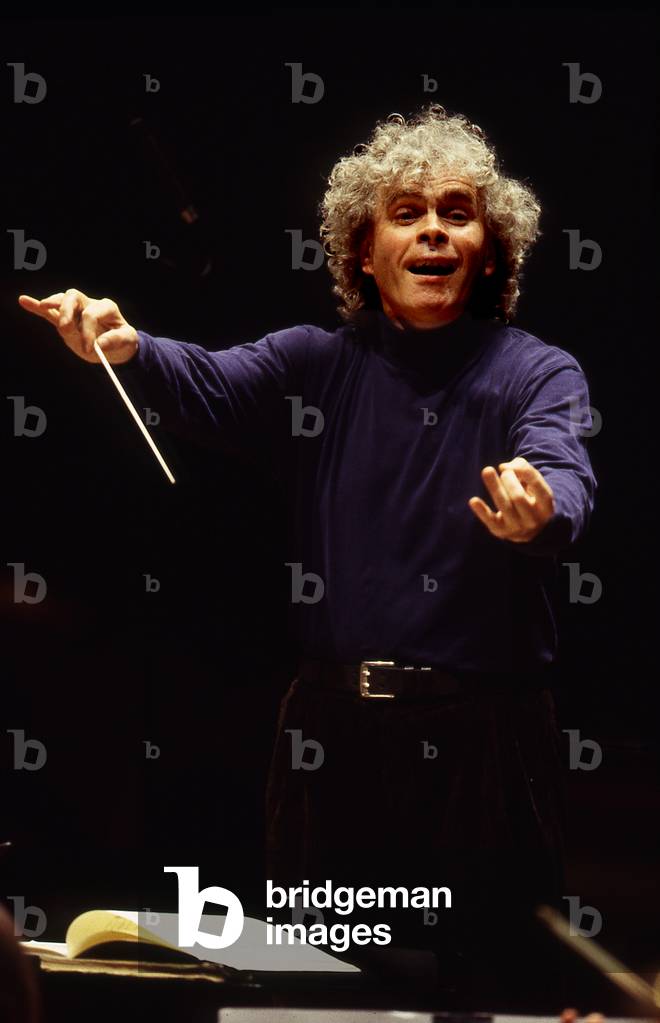 Simon Rattle - British conductor born in 1955 rehearsing in Paris in 1999