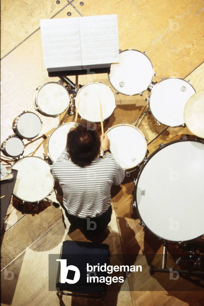Drums - a series of drums being played, as seen from above.