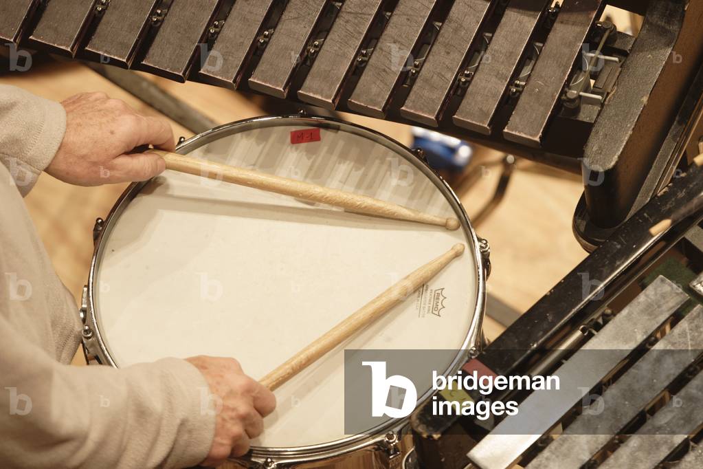 Drums with hands and vibraphone.