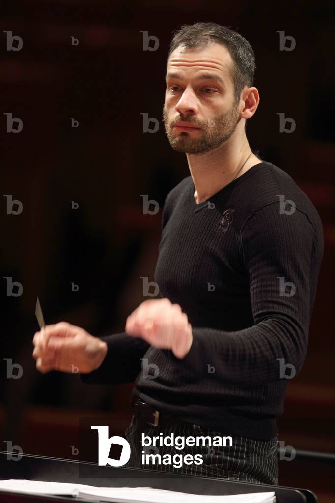 Dimitri Slobodenyuk conducting the Orchestre de Paris at the Salle Pleyel, Paris, January 2010. Russian conductor.
