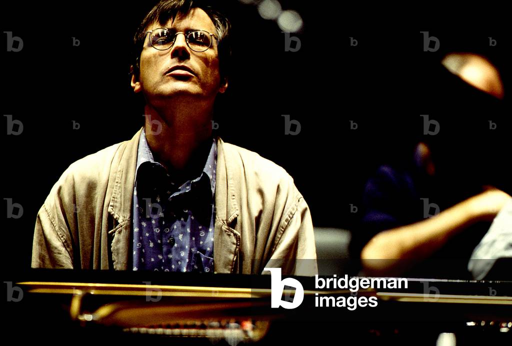 Christian Zacharias German conductor and pianist at his piano - born in 1950. Paris 1995