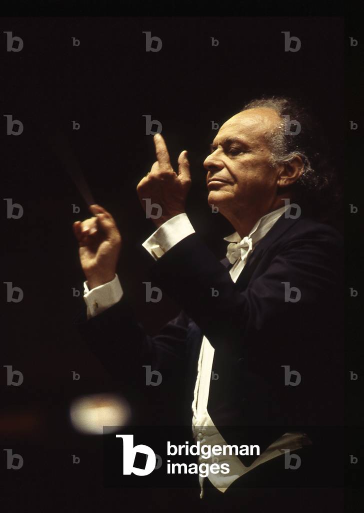 Lorin Maazel. Portrait photograph taken of the musician conducting in Paris, 1995. American conductor, born in 1931.