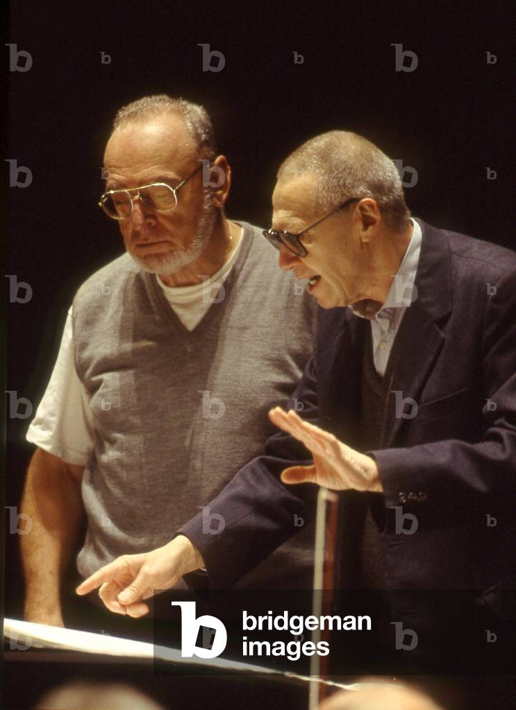 Gyoergy Kurtag, Hungarian composer, and Michael Gielen, Austrian conductor and composer, looking over a score at the Theatre des Champs Elysees, Paris, France, in 1998.