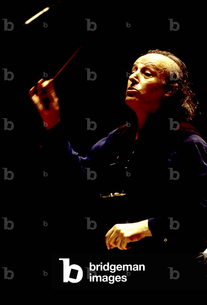 Eliahu Inbal. Portrait photograph taken of the artist conducting in 1996. Israeli conductor, born in 1936.