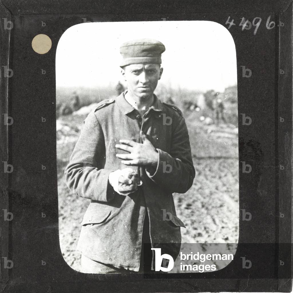 A wounded prisoner near Potijze, 20 September 1917 (lantern slide)