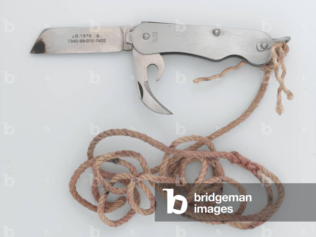 Clasp knife attached to a piece of string, 1981 circa (metal)