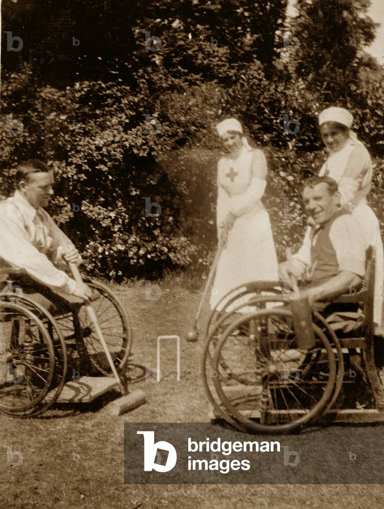 Disabled veterans play croquet at Eden Hall Convalescent Hospital near Coldstream, 1918 (b/w photo)