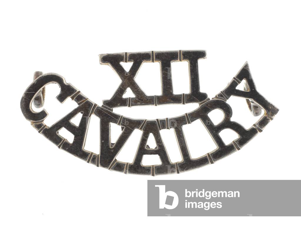 Shoulder title, 12th Cavalry, 1903-1922 (metal)