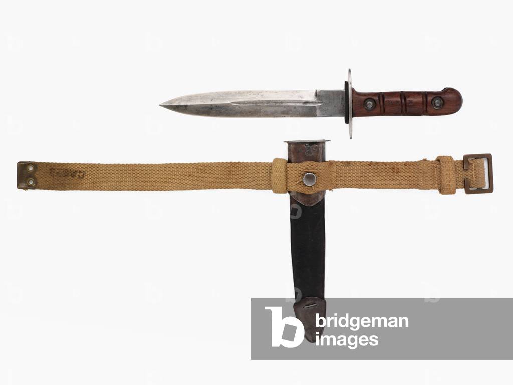 Fighting or survival knife with scabbard and webbing leg strap, 1942 circa (metal )