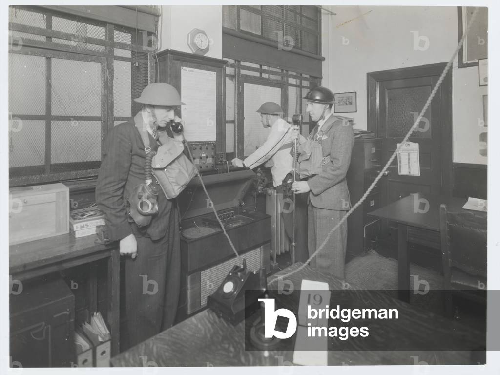 Home Guard personnel in communication centre, 1943 circa (b/w photo)