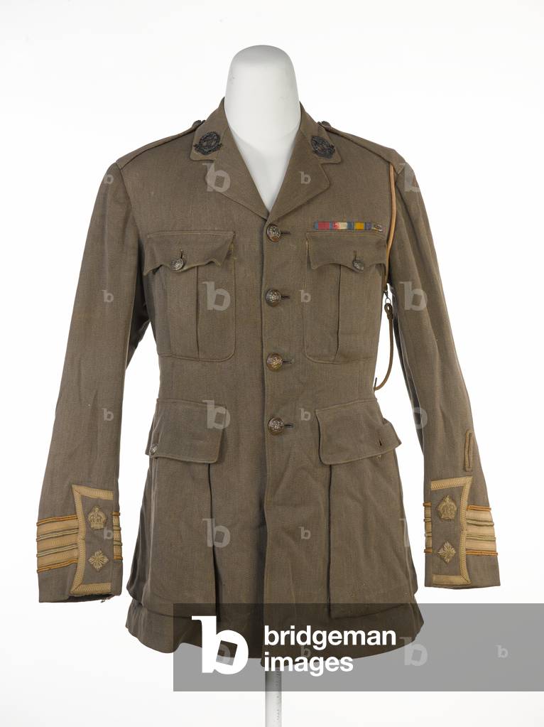 Service dress tunic worn by Colonel C P Rooke, DSO, 11th (Service) Battalion The Royal Warwickshire Regiment, 1915 circa (fabric)