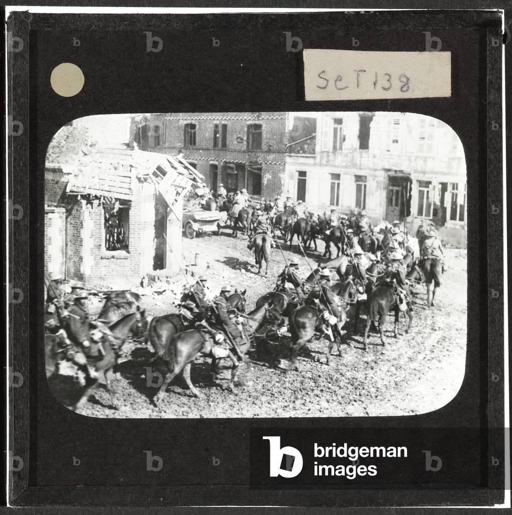 British cavalry riding through Arras, 11 April 1917 (lantern slide)