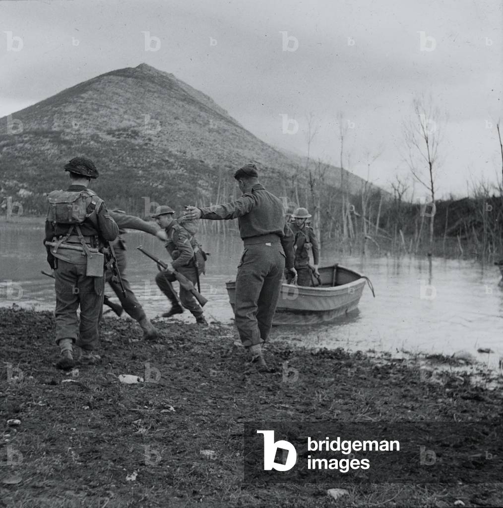 Men of D Company practising assault landings in collapsible boats, March, 1944
 (lantern slide)