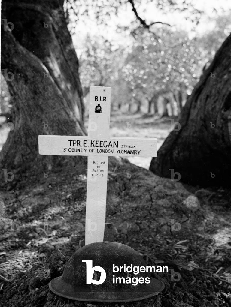 Grave of Trooper E Keegan, 3rd County of London Yeomanry (Sharpshooters), killed in action, Serracapriola, Italy, 2 October 1943 (b/w photo)