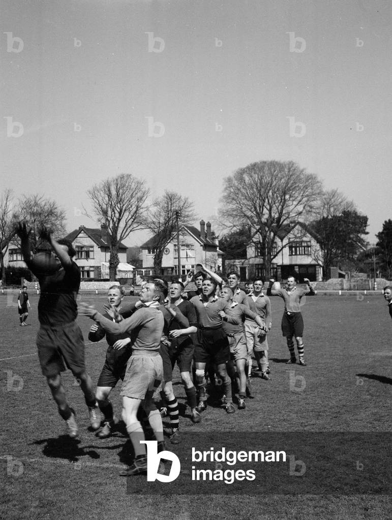 A rugby union match between 3rd County of London Yeomanry (Sharpshooters) and the 44th Royal Tank Regiment at Worthing in Sussex, 1944 (b/w photo)
