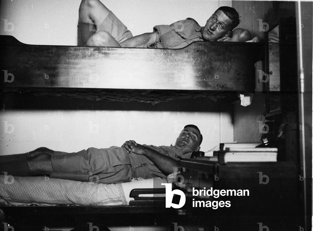 In a cabin. Jimmy Sale, Freddie Crowley, 3rd County of London Yeomanry (Sharpshooters), on board HMT Orion, en route to Egypt, 1941 (b/w photo)