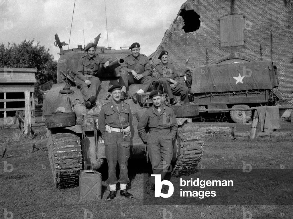 Sherman tank and crew, Regimental Head Quarters Tank Troop, 3rd/4th County of London Yeomanry (Sharpshooters), 1944 (b/w photo)