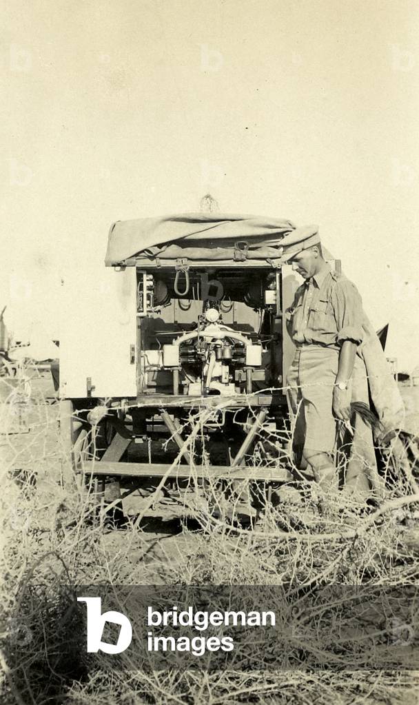 Captain William Leith-Ross next to a wireless wagon station, 1916 circa (b/w photo)