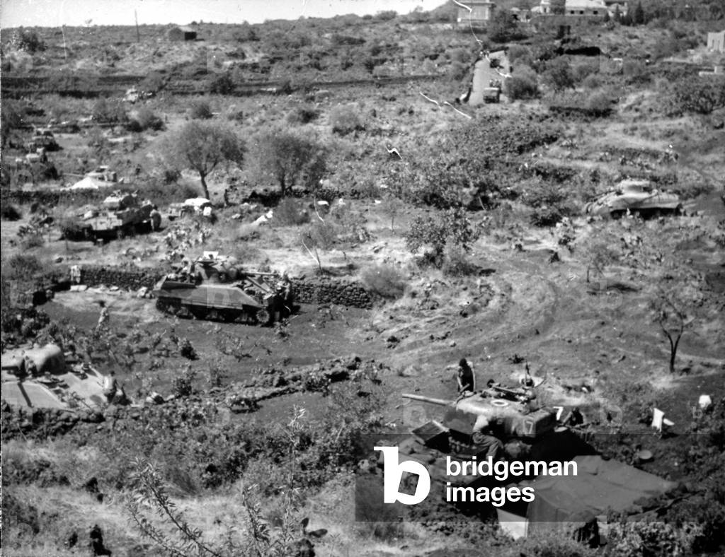 Vehicles outside Nicolosi, 1943 (b/w photo)