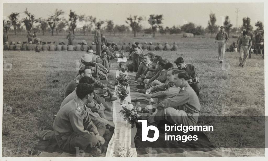 1st Battalion, 2nd Punjab Regiment, celebrate the end of the war in Italy, 1945 (b/w photo)
