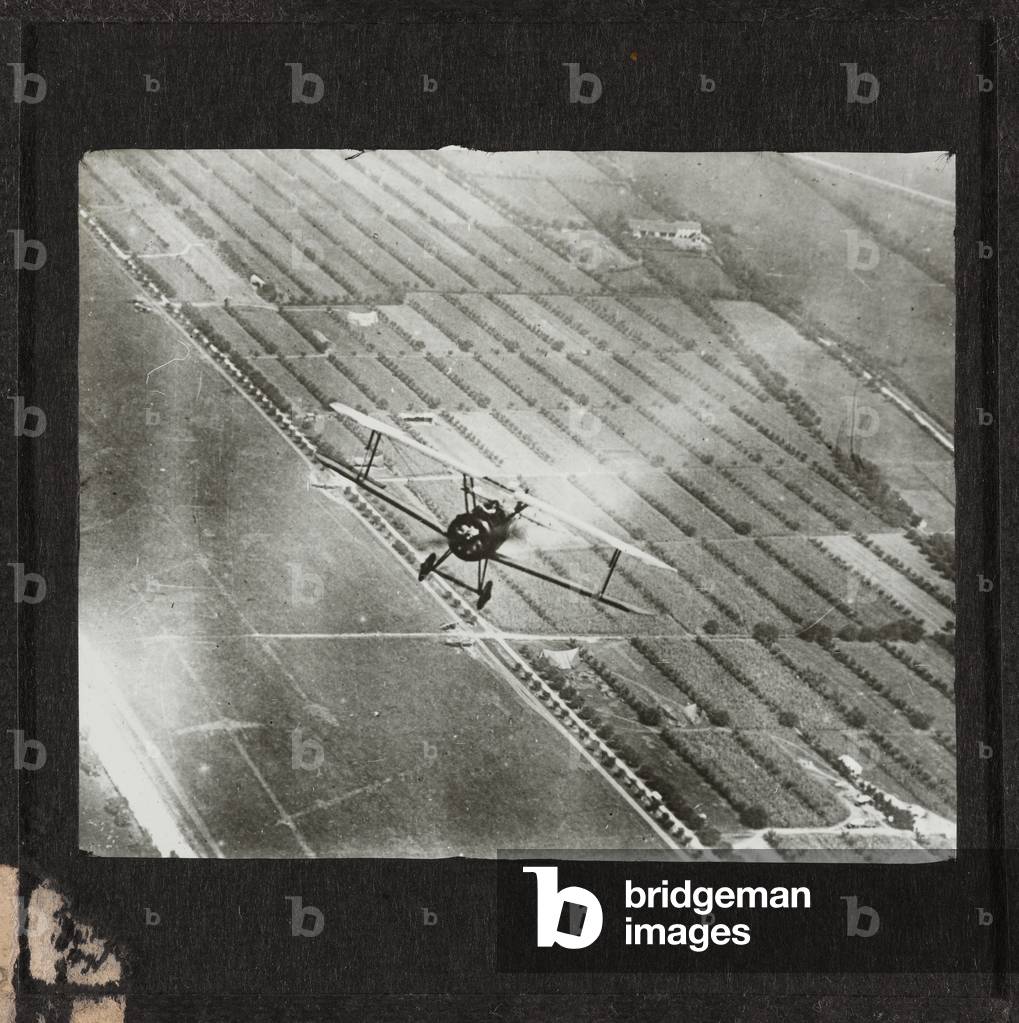 Major William Barker DSO, MC, of No. 28 Squadron in flight in a Sopwith Camel on the Italian front, 1917 (lantern slide)